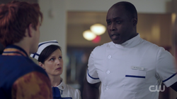 Doctor Masters briefing Archie on Fred's status