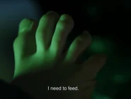 Alien grabbing Walt's foot