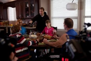 Family eating dinner.