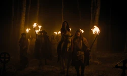 The gypsies approach the grave of an alleged 
