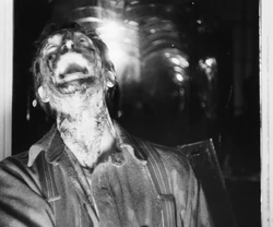  screams as he looks into the 