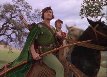 Errol Flynn as Robin Hood with Patric Knowles as Will Scarlet in The Adventures of Robin Hood (1938)