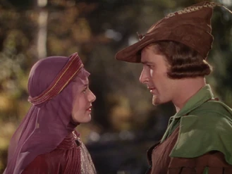 Olivia de Havilland as Marian and Errol Flynn as Robin Hood.