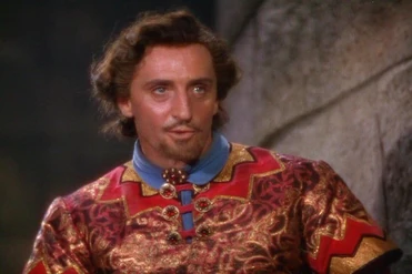 Basil Rathbone as Sir Guy of Gisbourne in The Adventures of Robin Hood 1938.