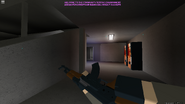 The entrance to the new elevator. The blueish-purple light is produced by the new DejaBlue vending machines.