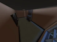 A small living, featuring a fireplace.