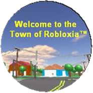 The badge everyone got for joining. Badge title: "I visited 1dev2's Town of Robloxia!" Badge Desc: "Simply join to recieve badge!"