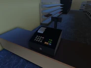 The cash register.