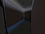 The janitor closet, storing several cleanup items.