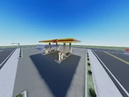 The gas station.