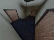 The second floor, featuring some doors.