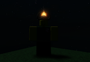 The accessory flame effect in-game at night. Note that it's still visible, yet not giving off light.
