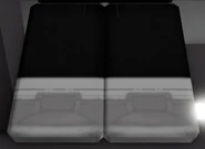 Albert's pants placed underneath the hanging clothes over at the Clothes Store.