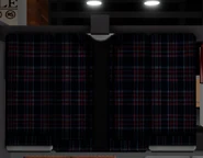 Thomas's shirt hanging on a clothing rack over at the Clothes Store.