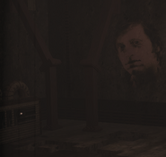 A face printed on the wall in "the little undulations", and the generator with the cork behind it.