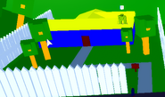 The blue house with a yellow roof