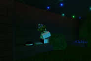 The Flawed Artist in her house at the sanctuary. The player is able to interact with her.