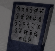The Atlantean alphabet on a post seen near the ice caverns exit., A-F on the top, and so on till Z.