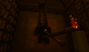 Impaled figure on wall in Tower, presumably OllieOddballOaks.