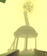The complete gazebo, after repeating all of the specific phrases, that the player must walk up to touch the orb surrounded by black particles to be teleported to “NOMORE."