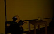 A mutilated person next to the "Looking glass" in one of the rooms.