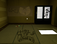The graffiti and alcohol as seen in the first room