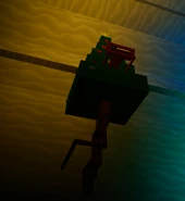 ORNAMENT_CHRISTMAS' miniature Christmas tree at which they reside.