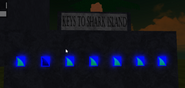 The keys needed for Shark Island on Octopus Island.