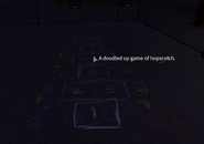 A game of hopscotch drawn with chalk around the park. Once the player hovers their mouse over it, it will read “A doodled up game of hopscotch.”