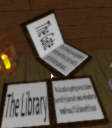 Two notebooks inside the library in the basement.