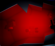 Bodies trapped in a red substance in the walls of the miniature cavern above.