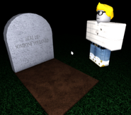 True_faces standing over Esmeralda's grave.