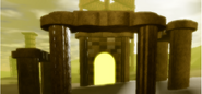 A portal hidden behind some ruins.