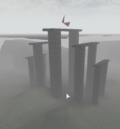 A mirror fragment above some pillars in the game Battlefield