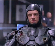 Alex Murphy in RoboCop's black armor.
