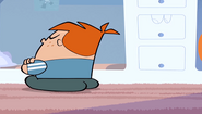 Gus sitting and refusing to let Robotboy into his body