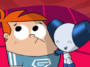 Robotboy in-love with Gus from being hit with a Cupid arrow.