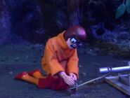 Velma setting up a trap for Jason while complaining about her virginity.