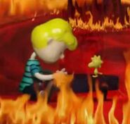 A dead Woodstock on Schroeder's piano.