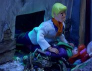 Fred after landing on Daphne in the secret room.