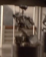 S-A-I-N-T Number 6 [Non Operational] on pedestal in the foyer