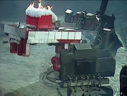 Shunt briefly elevates the smouldering Mammoth off the ground.