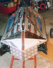 The Steel Avenger as Tin Tackler, in Techno Games