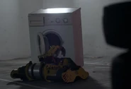 The Series 8 Sabretooth rams a washing machine, during a VT clip aired in Battle of the Stars, Episode 1