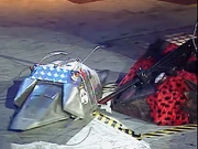 Depoppesaurus Rex attempts to evade Diotoir's lifter