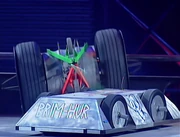 Weeliwako is pushed into the wall by Brimhur