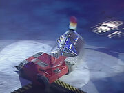 The Steel Avenger pushes Schumey Too into the Pit and dents the spoiler both at once