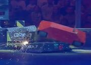 Storm 2 rams Firestorm 5 against the arena wall