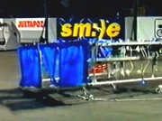 Roach in the arena, with half of its tarp covering