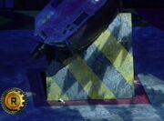 A beaten Destructosaur is chucked by the Floor Flipper